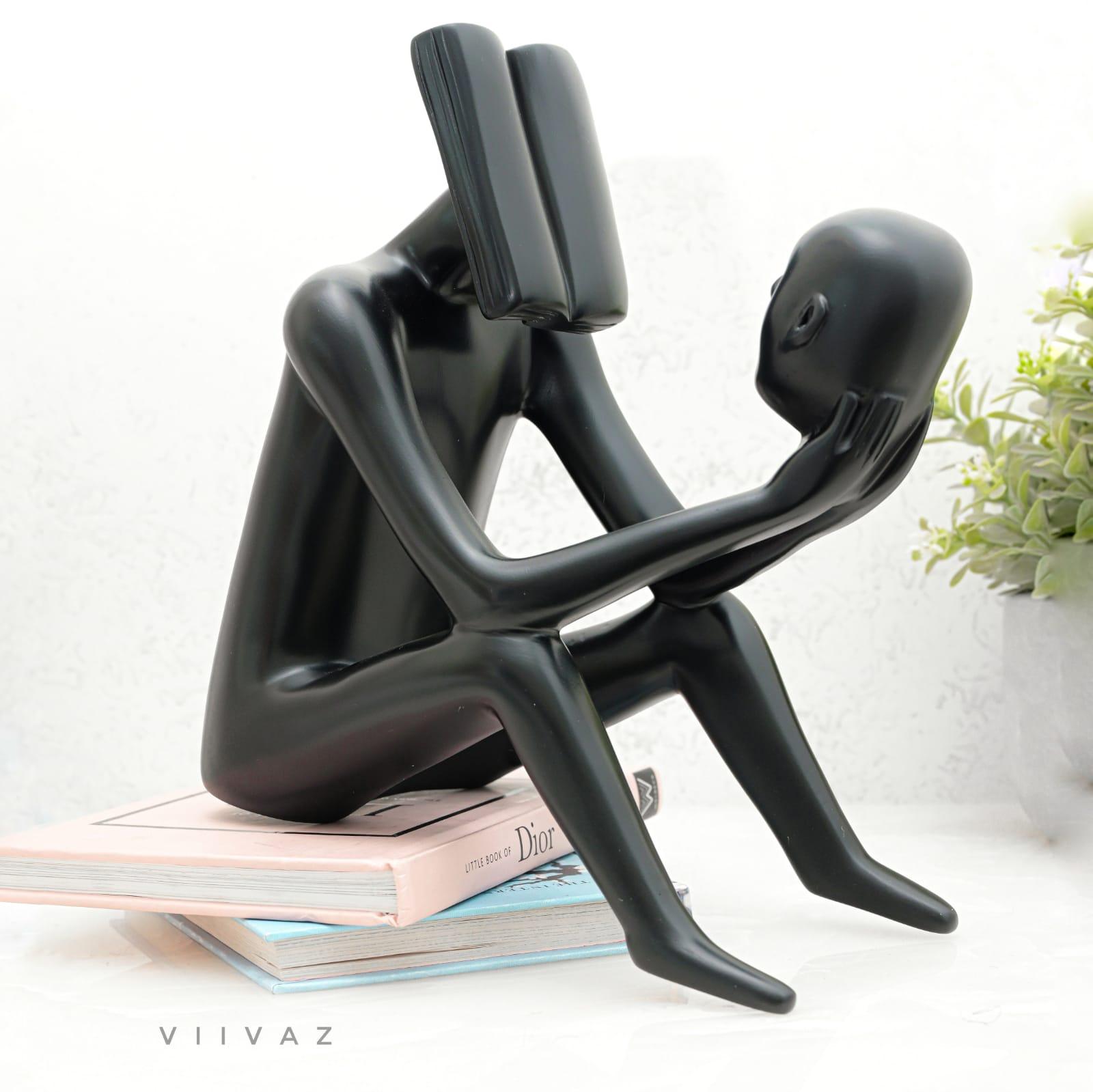 Abstract Man Reading a book sculpture